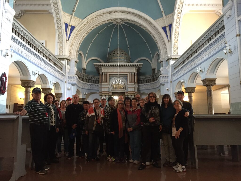 Travelers inside the Vilnius Syngogue