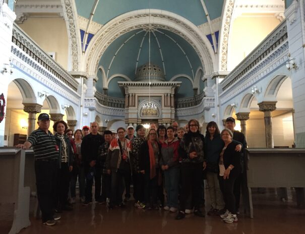 Travelers inside the Vilnius Syngogue